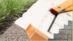 Tuinontwerp op papier met potlood, rolmaat en beplanting