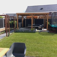 Tuinoverkapping of afdak compleet met EPDM dakbedekking, verlichting en regenton. - Hoveniersbedrijf C.K. van Mourik Buurmalsen West-Betuwe Buren Tiel Culemborg