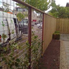 Betongaas in combinatie met plankenschermen - Hoveniersbedrijf C.K. van Mourik Geldermalsen Tiel Culemborg