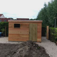 Bouw van een tuinberging en bijbehorend grondwerk. - Hoveniersbedrijf C.K. van Mourik de hovenier voor West Betuwe, Tiel, Culemborg, Geldermalsen, Buren