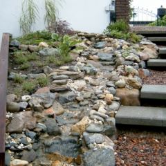 Waterval op dijkhelling - Hoveniersbedrijf C.K. van Mourik Tuinontwerp Katja Dupont IJzerhart Tuinarchitekt