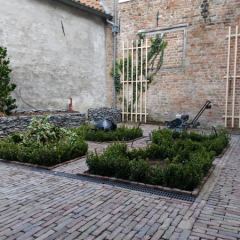 Stadstuin met Engelse invloeden. Hoveniersbedrijf C.K. van Mourik